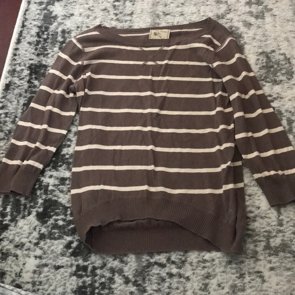 Easy to throw on sweater. Nicely paire with jeans